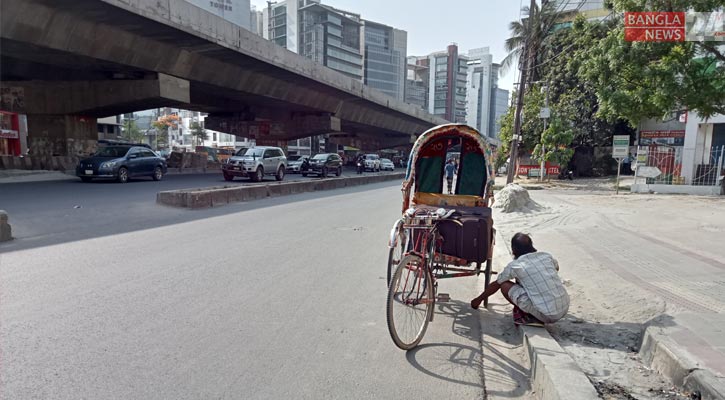 তাপপ্রবাহে হাঁসফাঁস করছে খেটে খাওয়া মানুষ